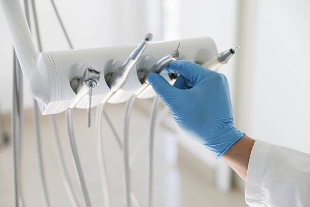 Professional Tooth Extraction technician working in Rose Hill, KS